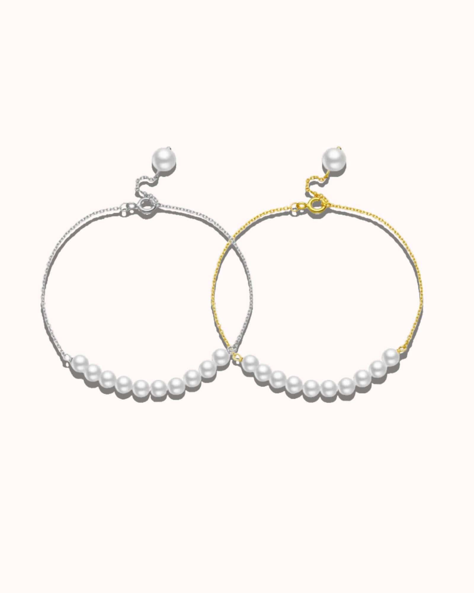 Two pearl bracelets on a white background