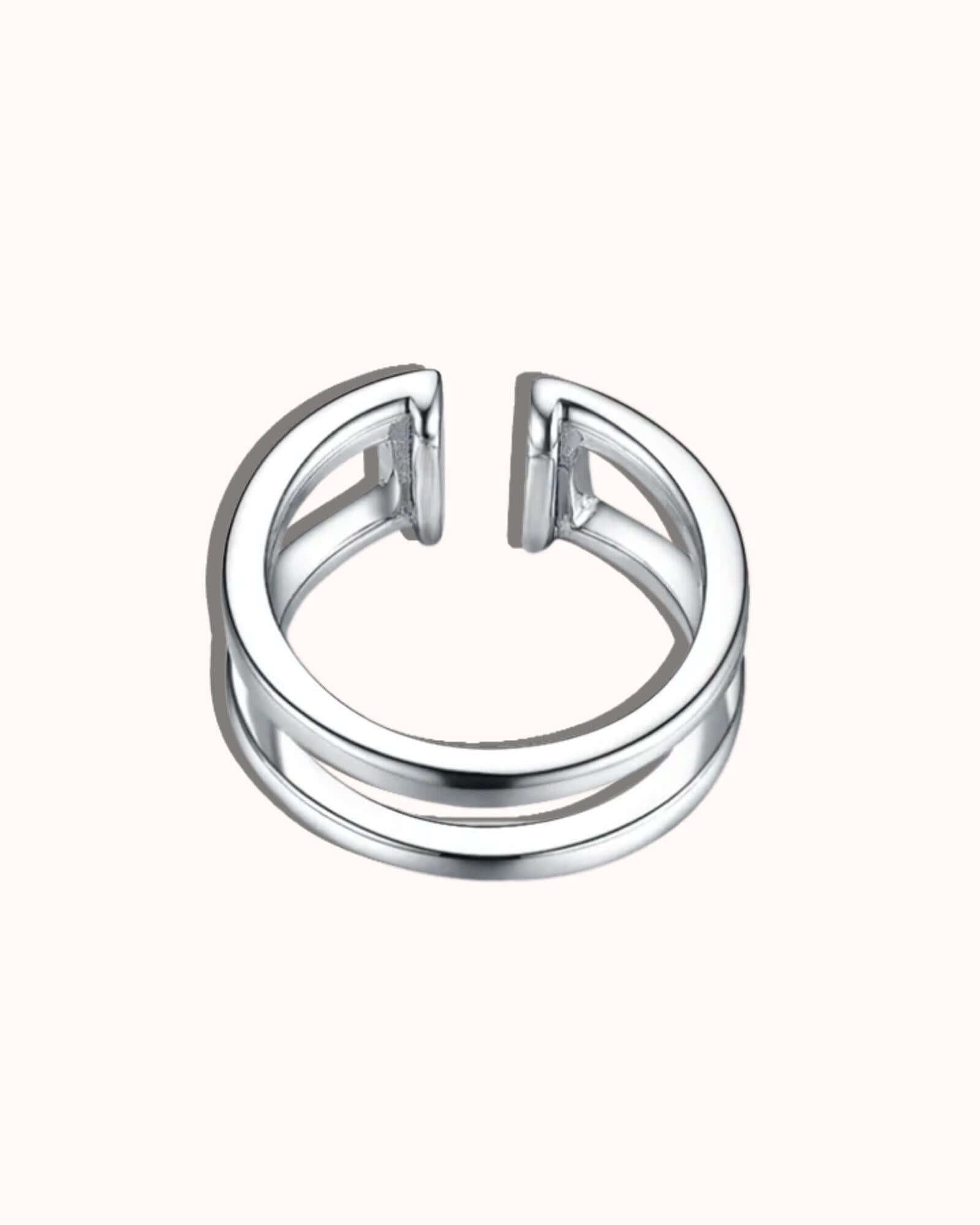 double ear cuff jewellery in silver featuring two linked half circles for a stylish look.