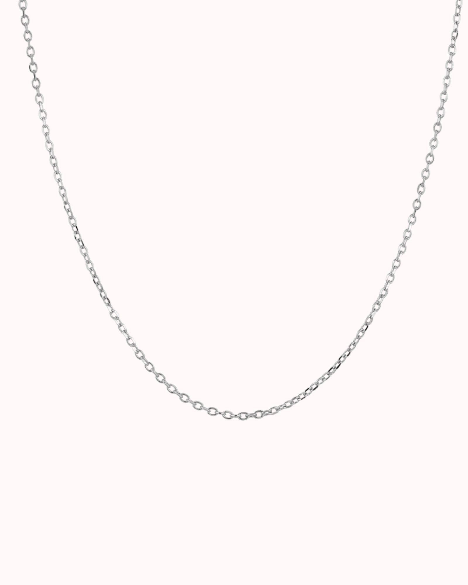 simple silver cable chain 16 inch displayed against a soft background showcasing its elegant design.