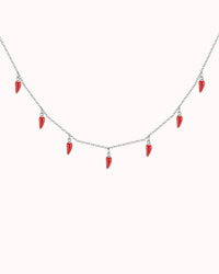 Spicy Bloom Chilli Charm Necklace featuring red chilli charms on a delicate silver chain.