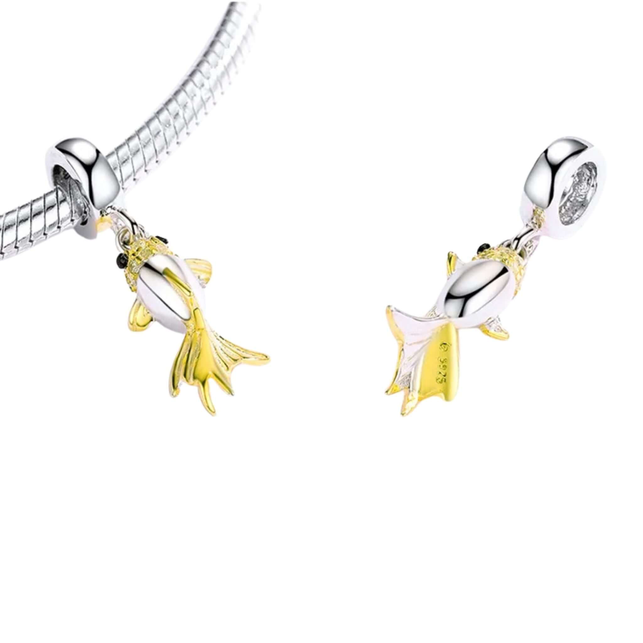 Charm featuring yellow enamel fish on a silver bracelet, perfect for adding playful elegance to accessories.