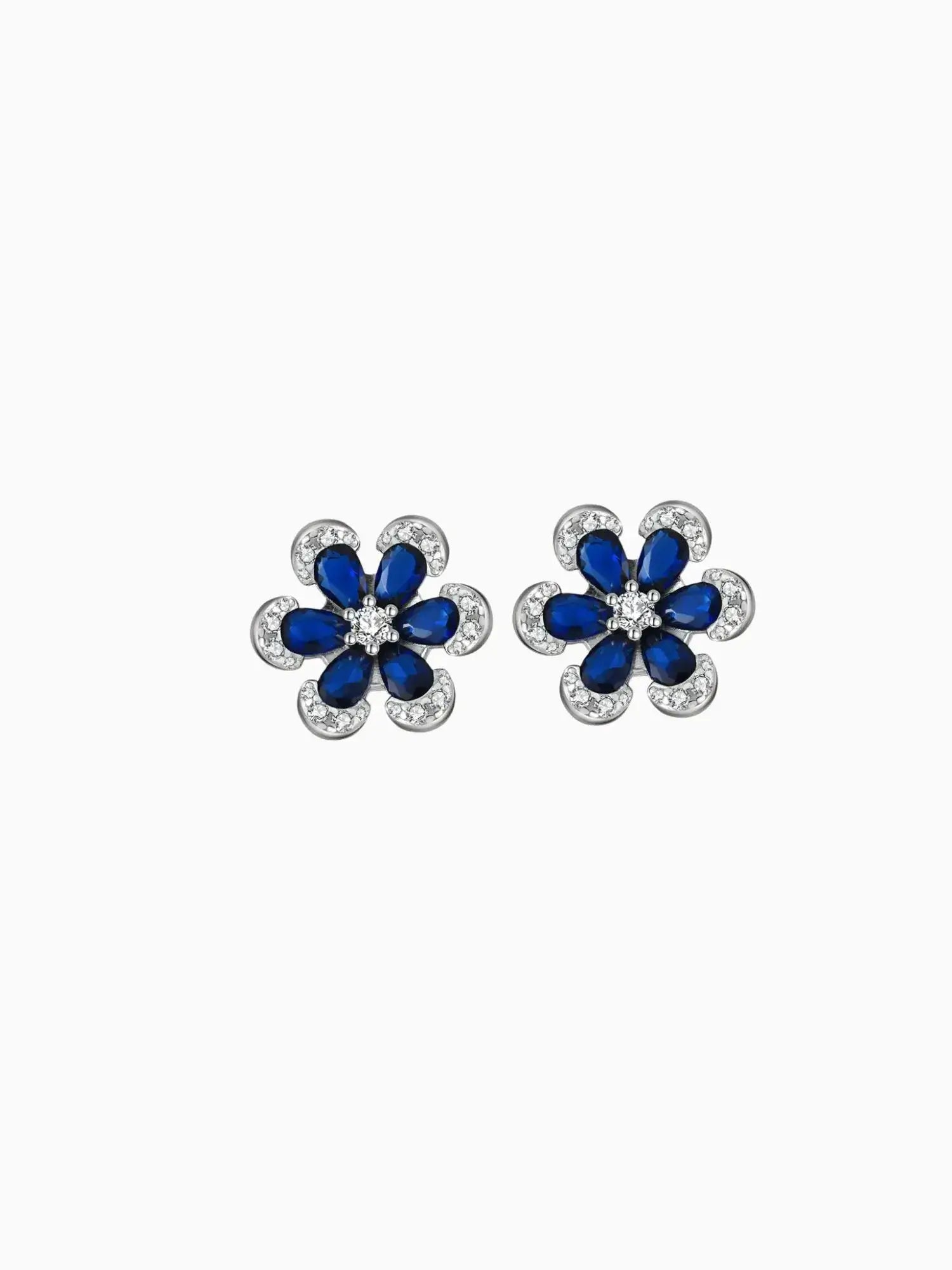 Blue Sapphire Flower Stud Earrings featuring blue sapphires and zirconia stones in floral design.