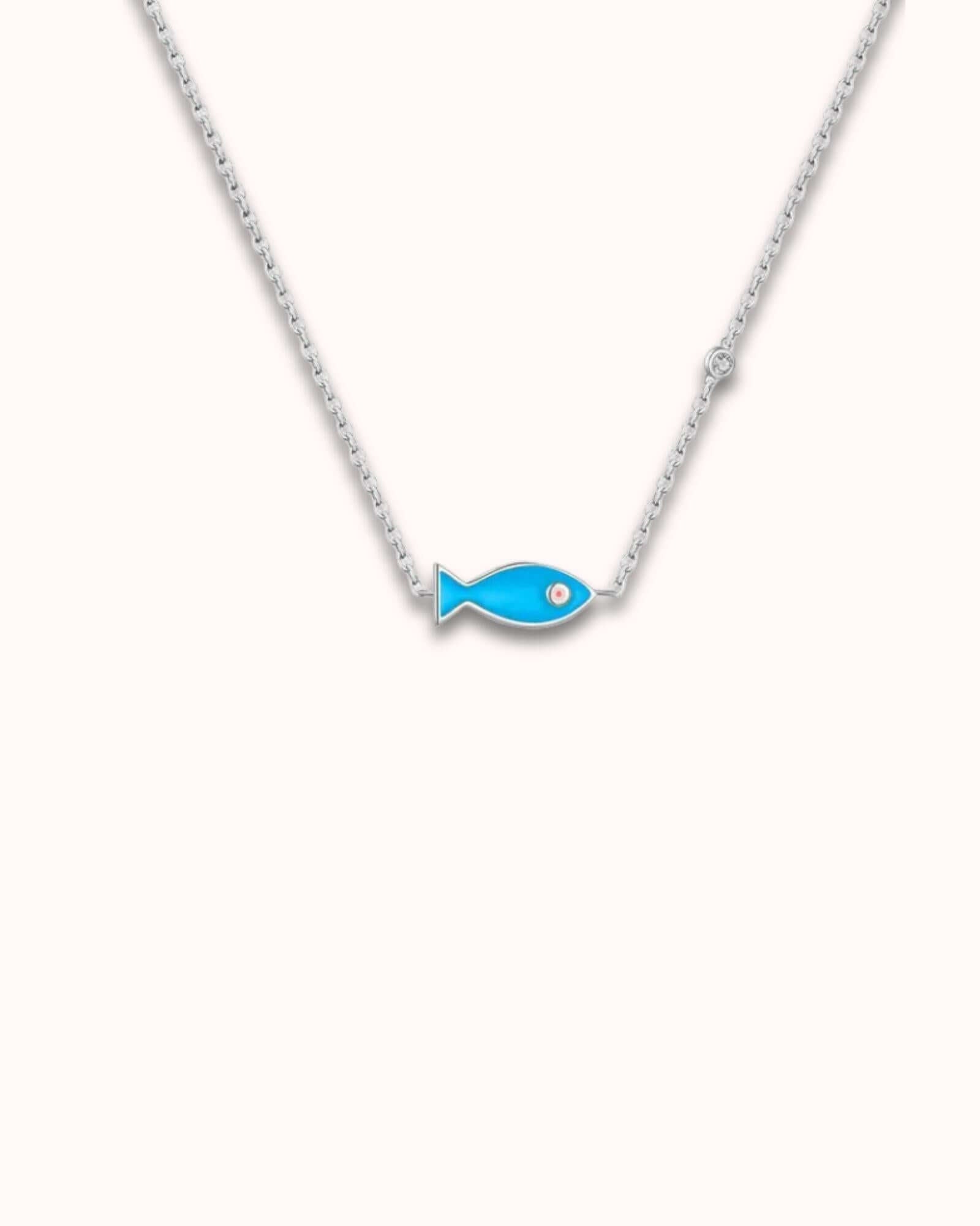 Vintage fish pendant necklace in sterling silver with blue enamel and zircon accent, perfect for summer aesthetics.