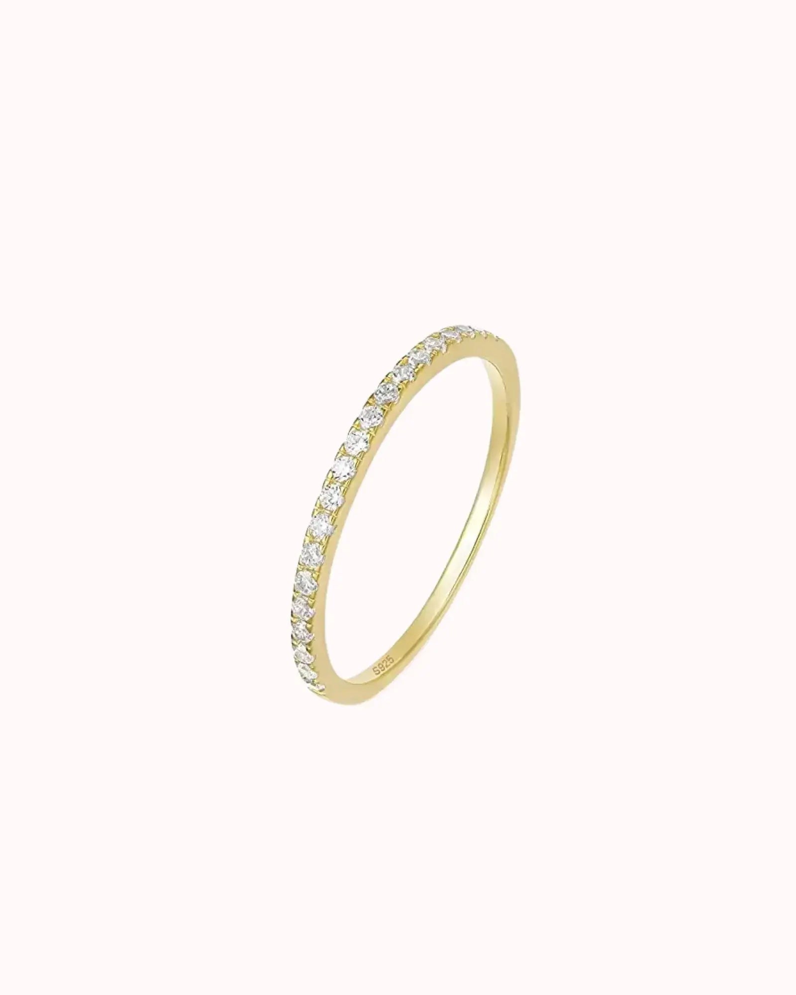 Half Eternity Stackable Ring in Gold with bezel-set zircons on a sleek 925 sterling silver band.