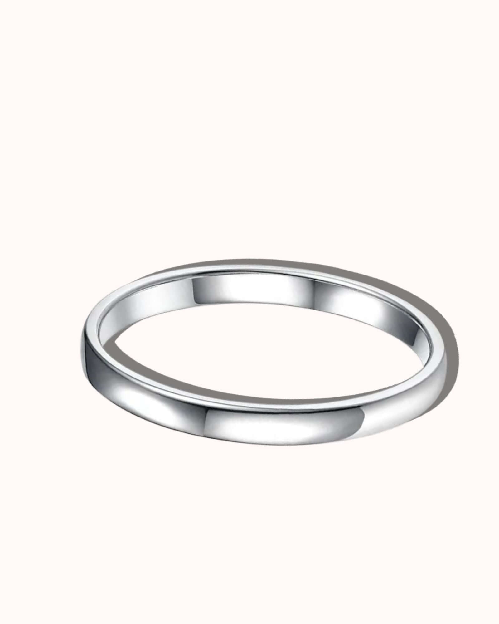 Plain silver ring showcasing timeless elegance and minimalist design with a polished surface.