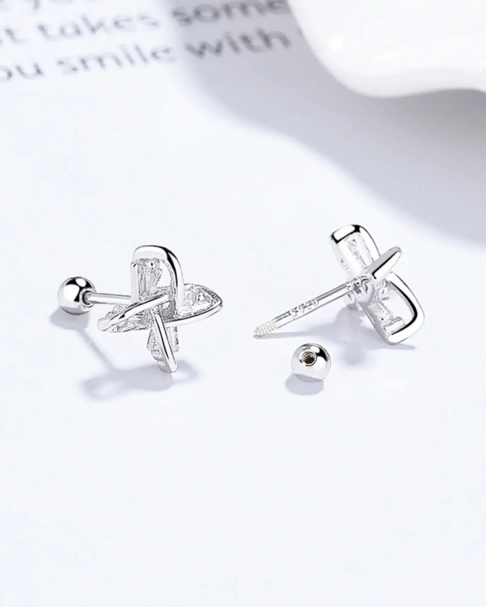 Elegant windmill ear studs made of 925 sterling silver, featuring a modern design in yellow gold and white gold plating.