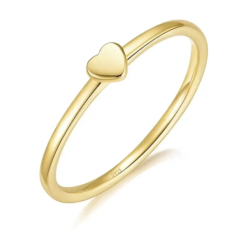 Golden Whisper heart-shaped ring in 18k gold plating over 925 sterling silver, perfect for stacking and adding elegance.