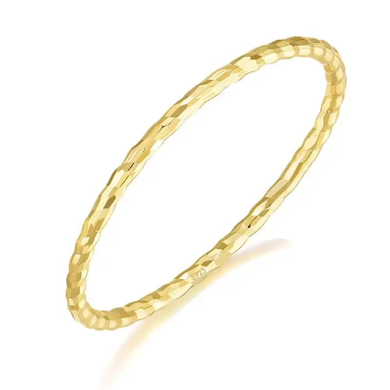 Golden Whisper Ring crafted from 925 sterling silver, elegantly plated in 18k gold with a textured finish.