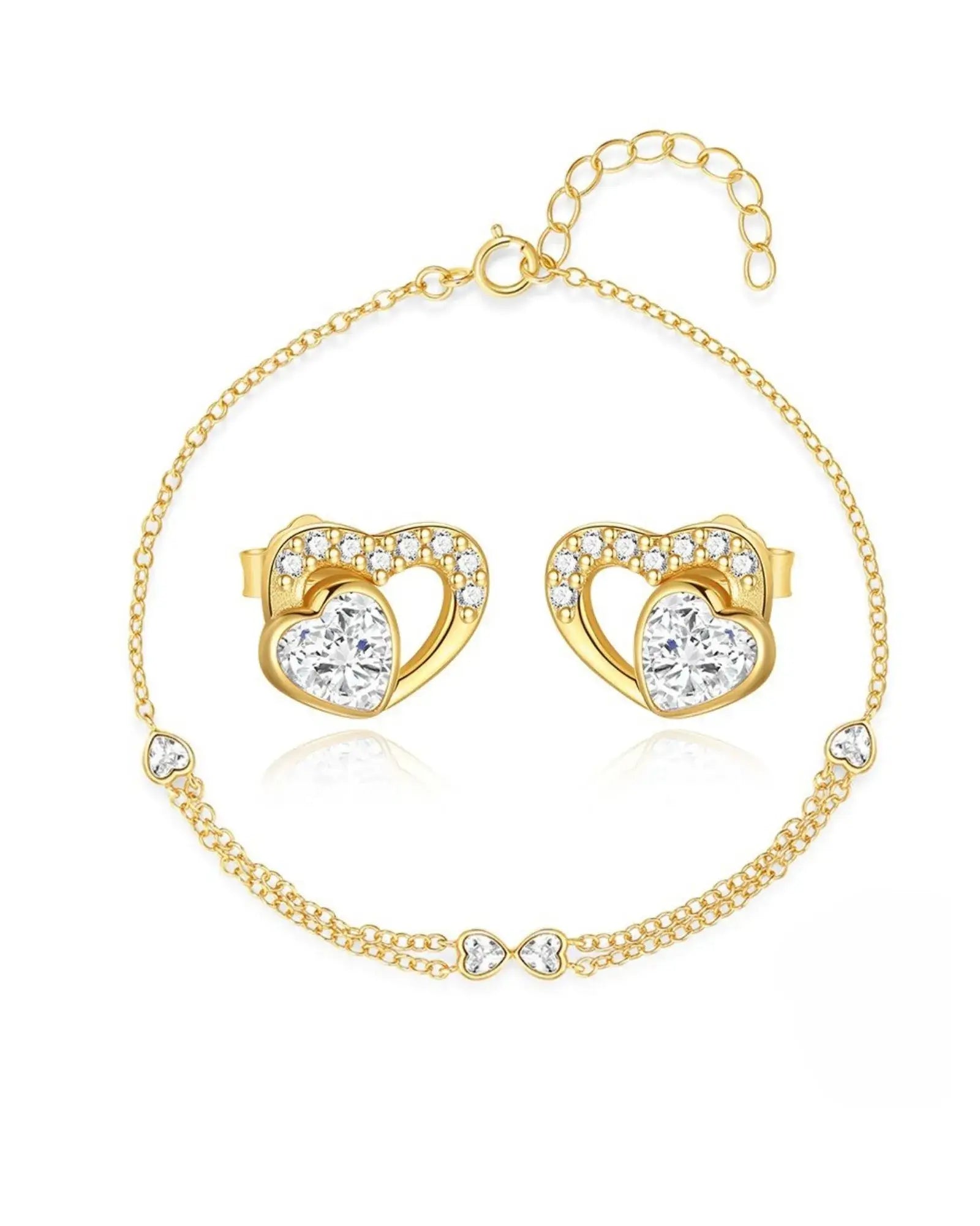 Heart-shaped earrings with sparkling stones and matching bracelet, elegant gold jewelry set for special occasions.