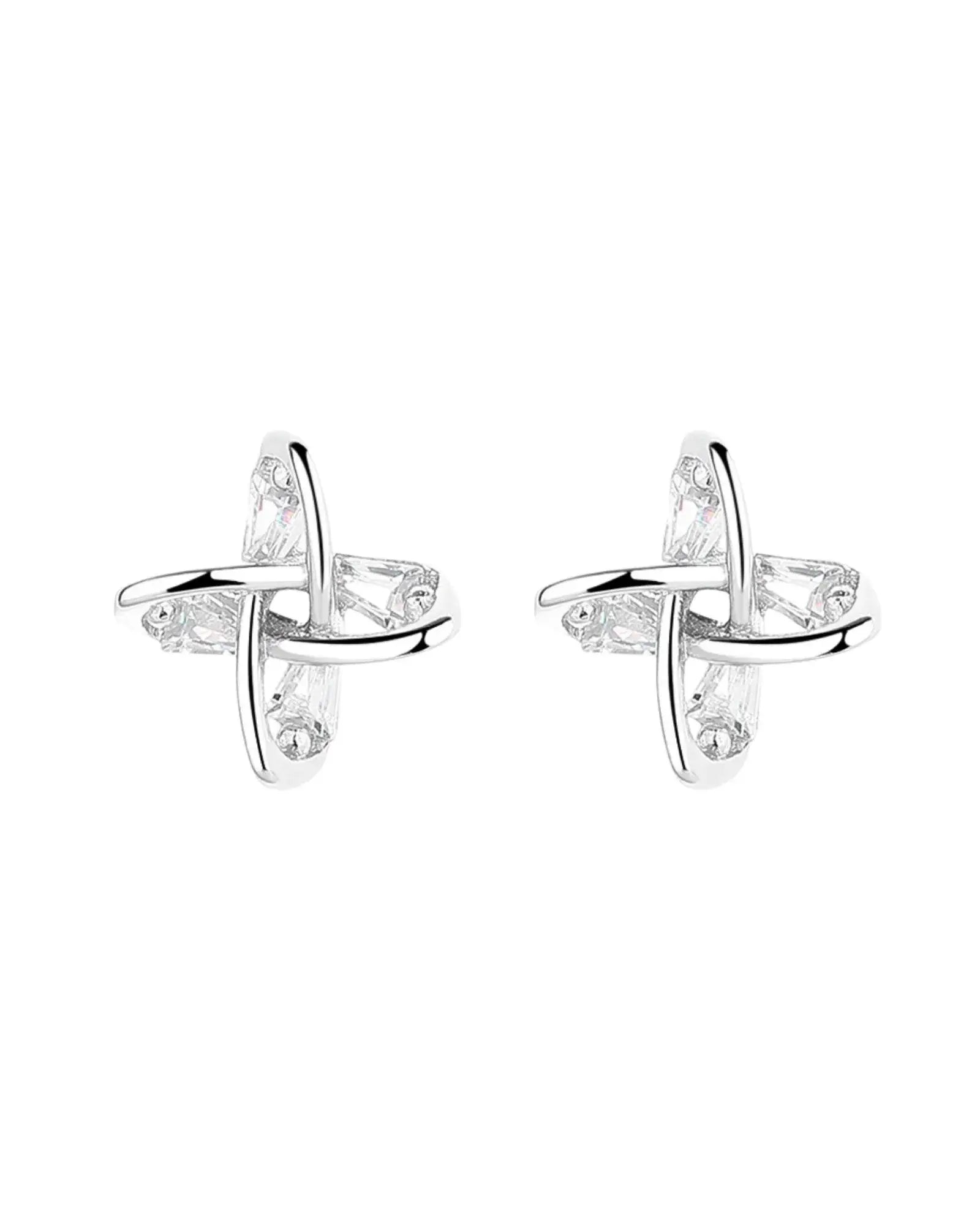 Elegant windmill design ear studs in 925 sterling silver with clear gemstones, perfect for stylish outfits.