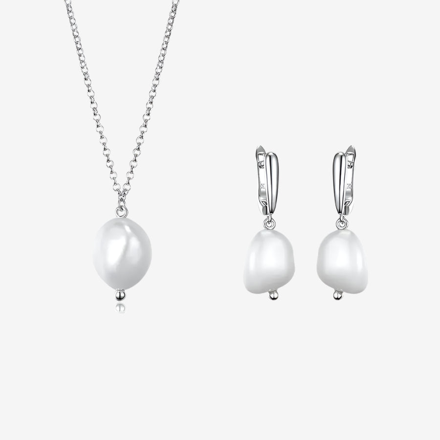 Lumera Pearl Set in 925 sterling silver with white gold plating, featuring a necklace and earrings with elegant pearls.