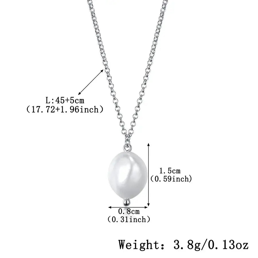 Lumera Pearl Pendant Necklace in sterling silver with white gold plating, featuring a 1.5x0.8cm pearl, classic elegance.