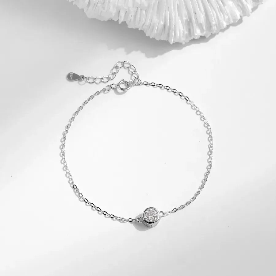 0.5 ct moissanite halo bracelet with sterling silver chain and bezel-set moissanite