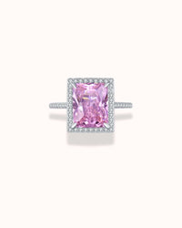 Pink zirconia ring in sterling silver, featuring a large pink gemstone and intricate detailing, perfect for cocktail attire.