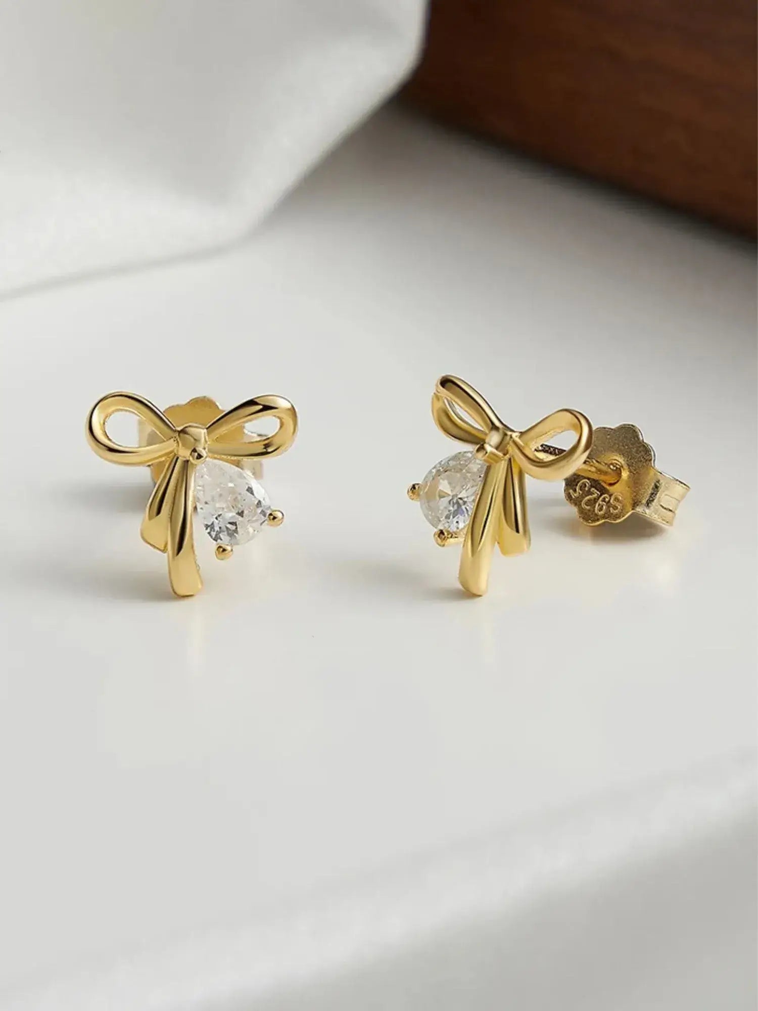 Trendy Bowknot Stud Earrings in 14k Gold, featuring AAAAA Zircon, perfect for romantic everyday wear.