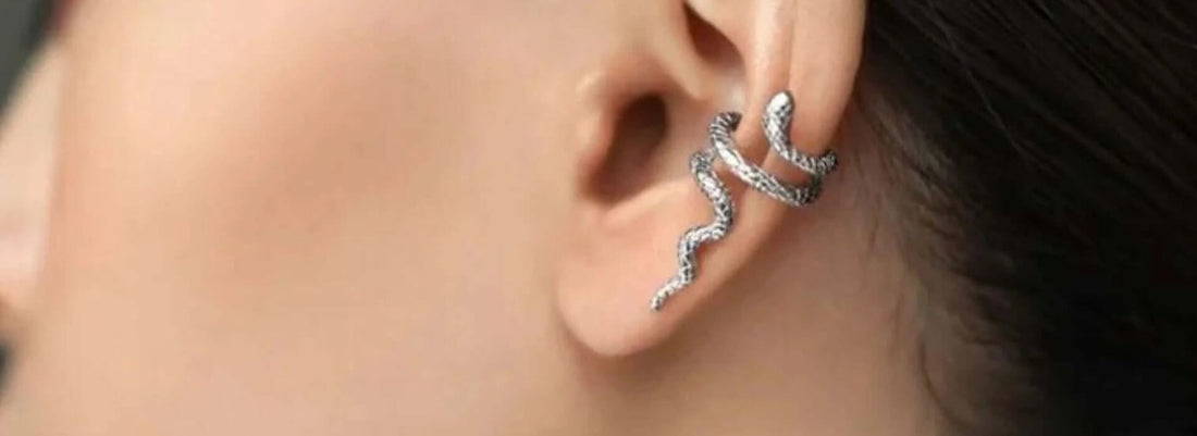 Close-up of a snake ear cuff showcasing stylish ways on how to style ear cuffs for a trendy look.