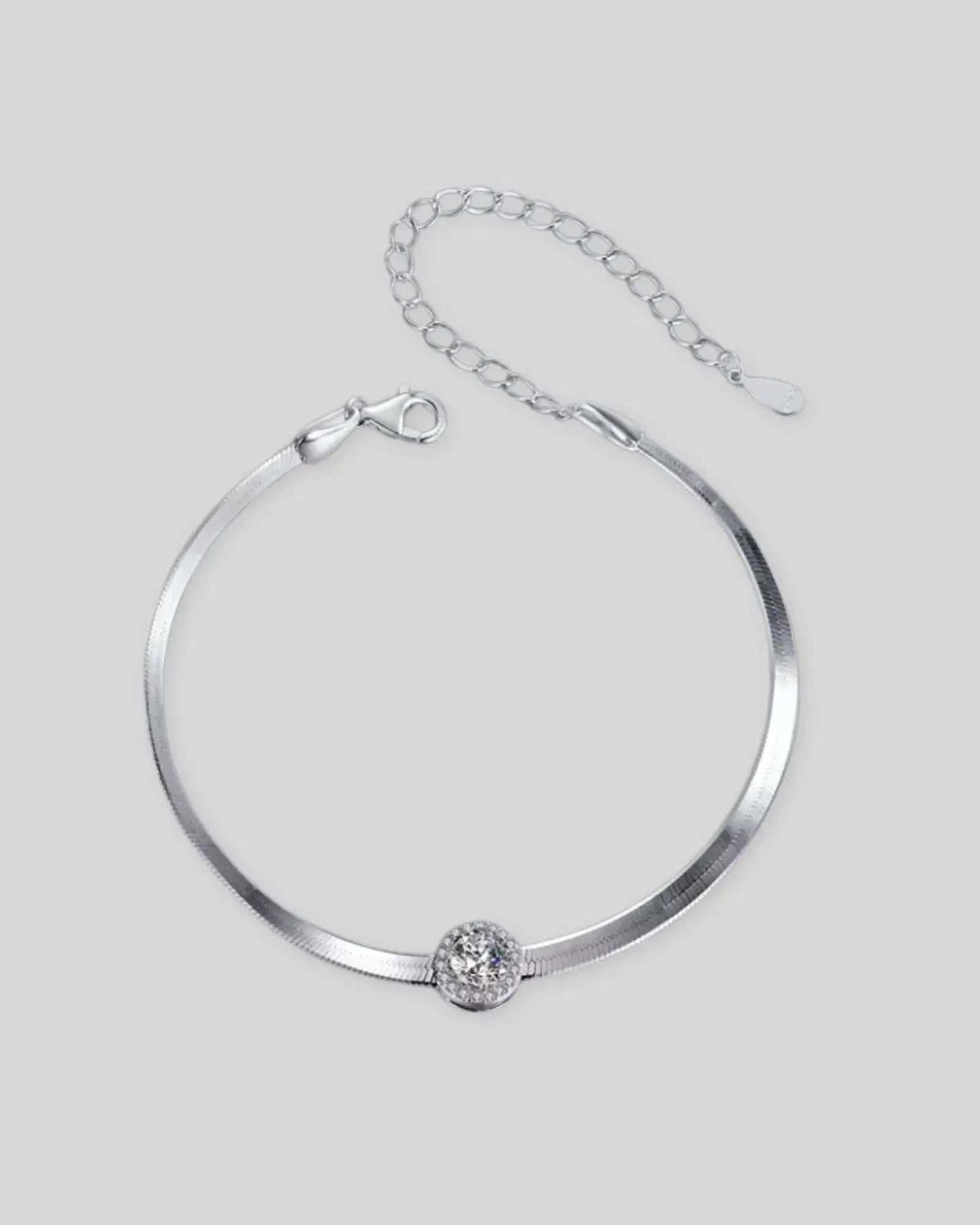 0.5CT Moissanite Halo Bracelet with sterling silver chain and adjustable clasp, featuring a sparkling stone centerpiece.