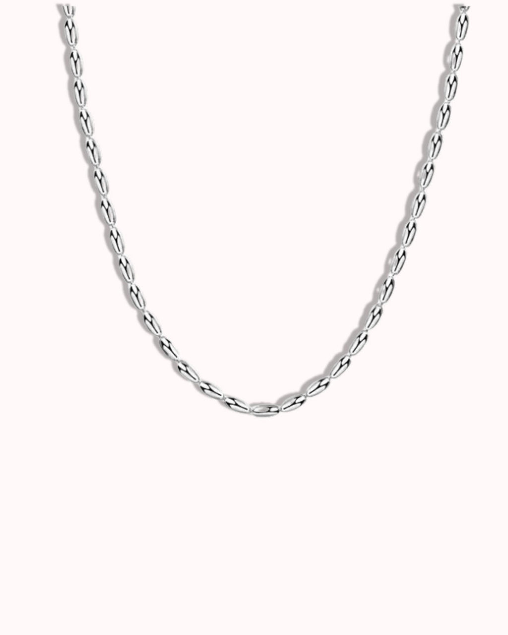 Simple Oval Bead Chain in Silver featuring smooth oval beads for a classic and versatile look.