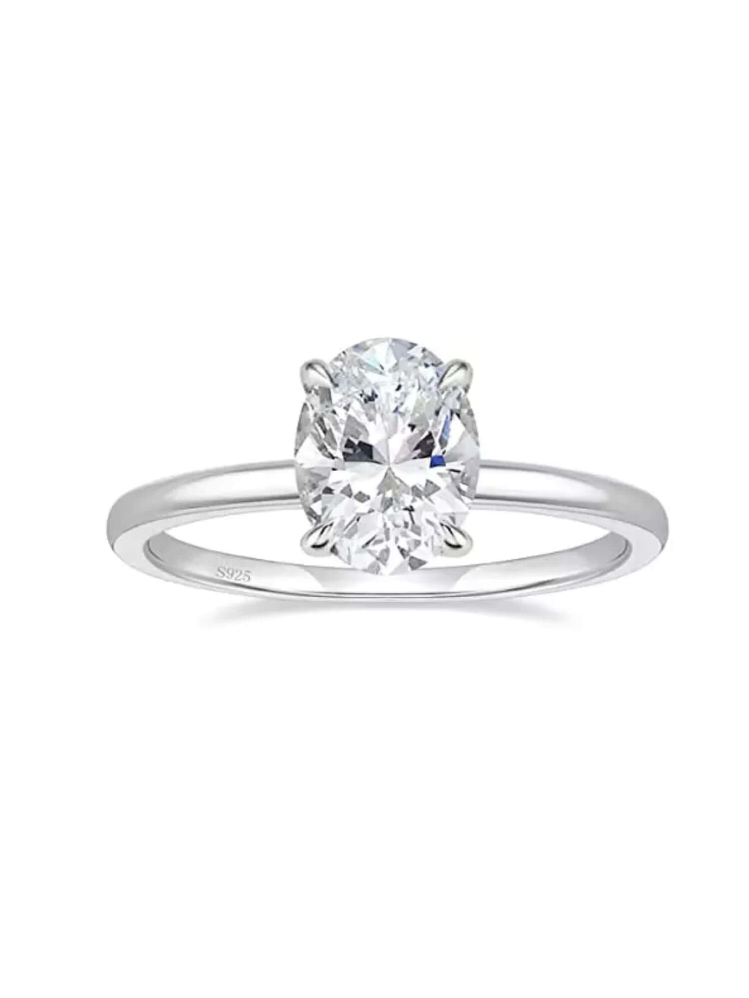 3CT oval cut cubic zirconia ring in polished sterling silver, showcasing bold elegance and modern design.