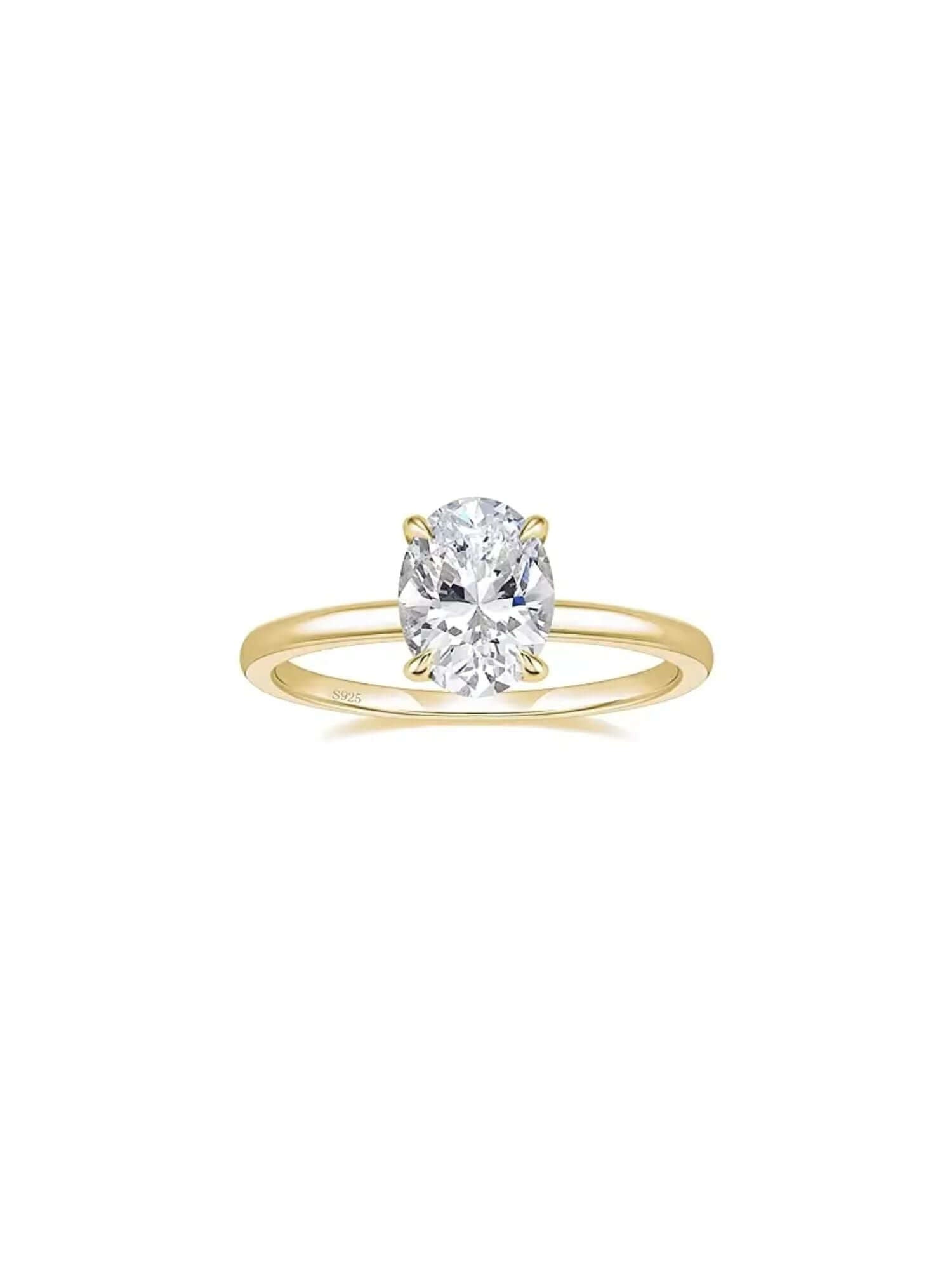 3CT oval cut solitaire cubic zirconia ring on a polished yellow gold band, elegant and modern design.
