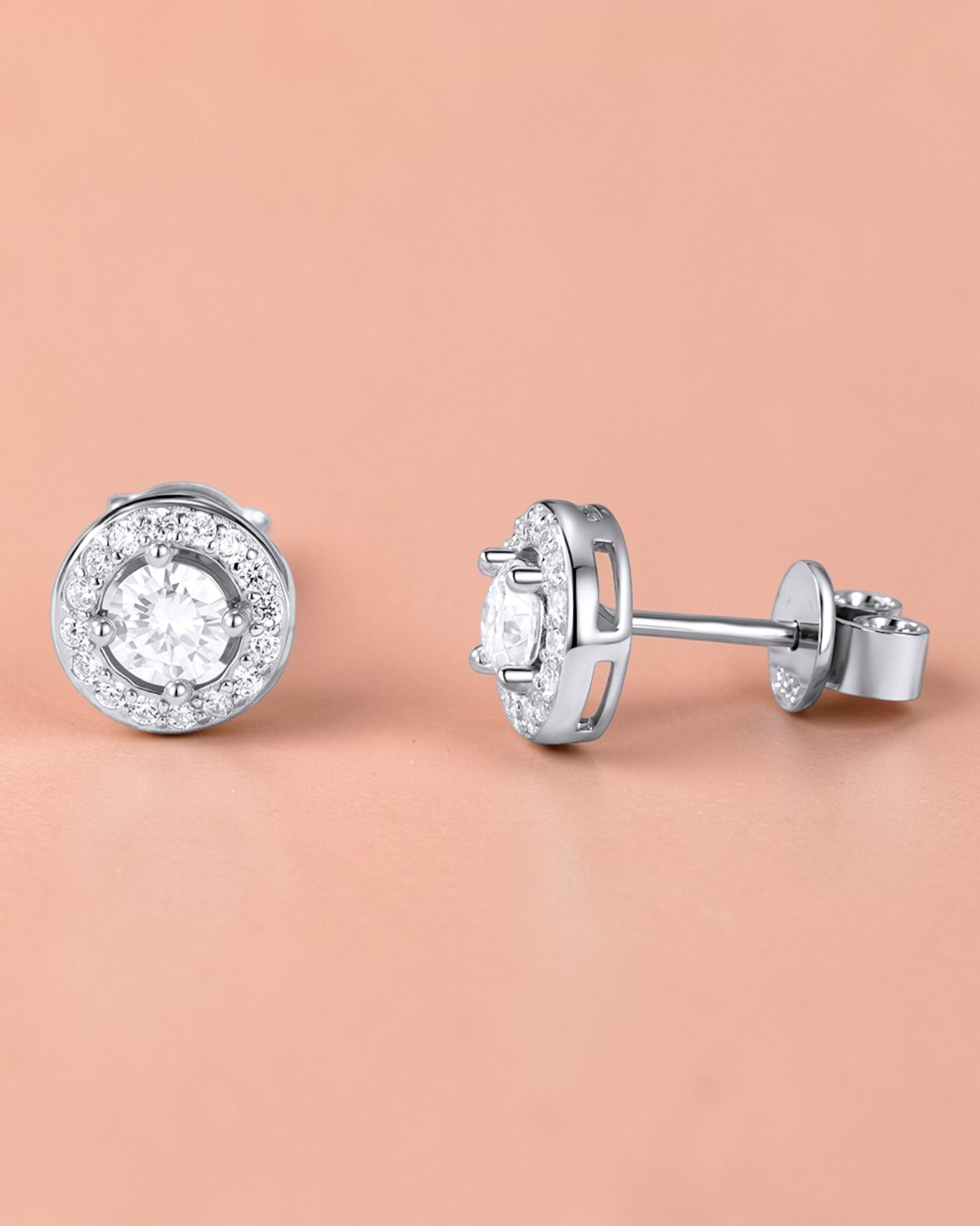 Round Brilliant Cut moissanite Stud with sparkling cubic zirconia accents in a sleek setting.