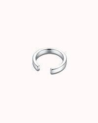 Silver ear cuff plane non piercing, sleek design for versatile styling and comfort.