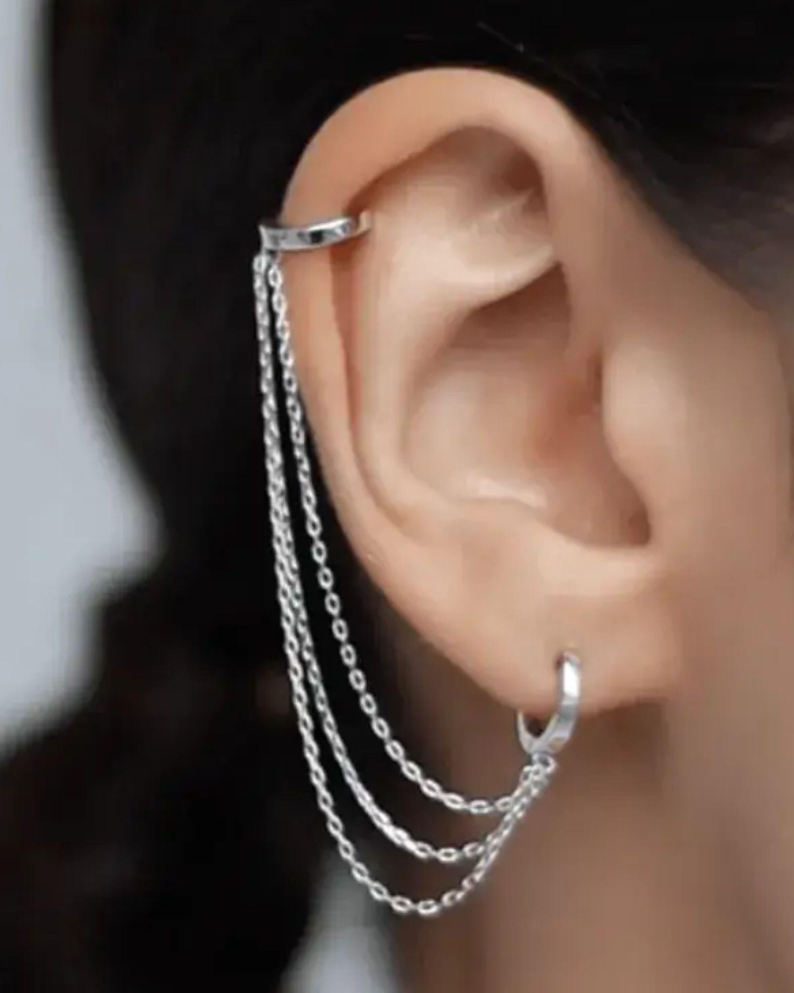 Stylish Ear Chain Cuffs in 925 sterling silver hanging from the ear, showcasing elegant design and craftsmanship.