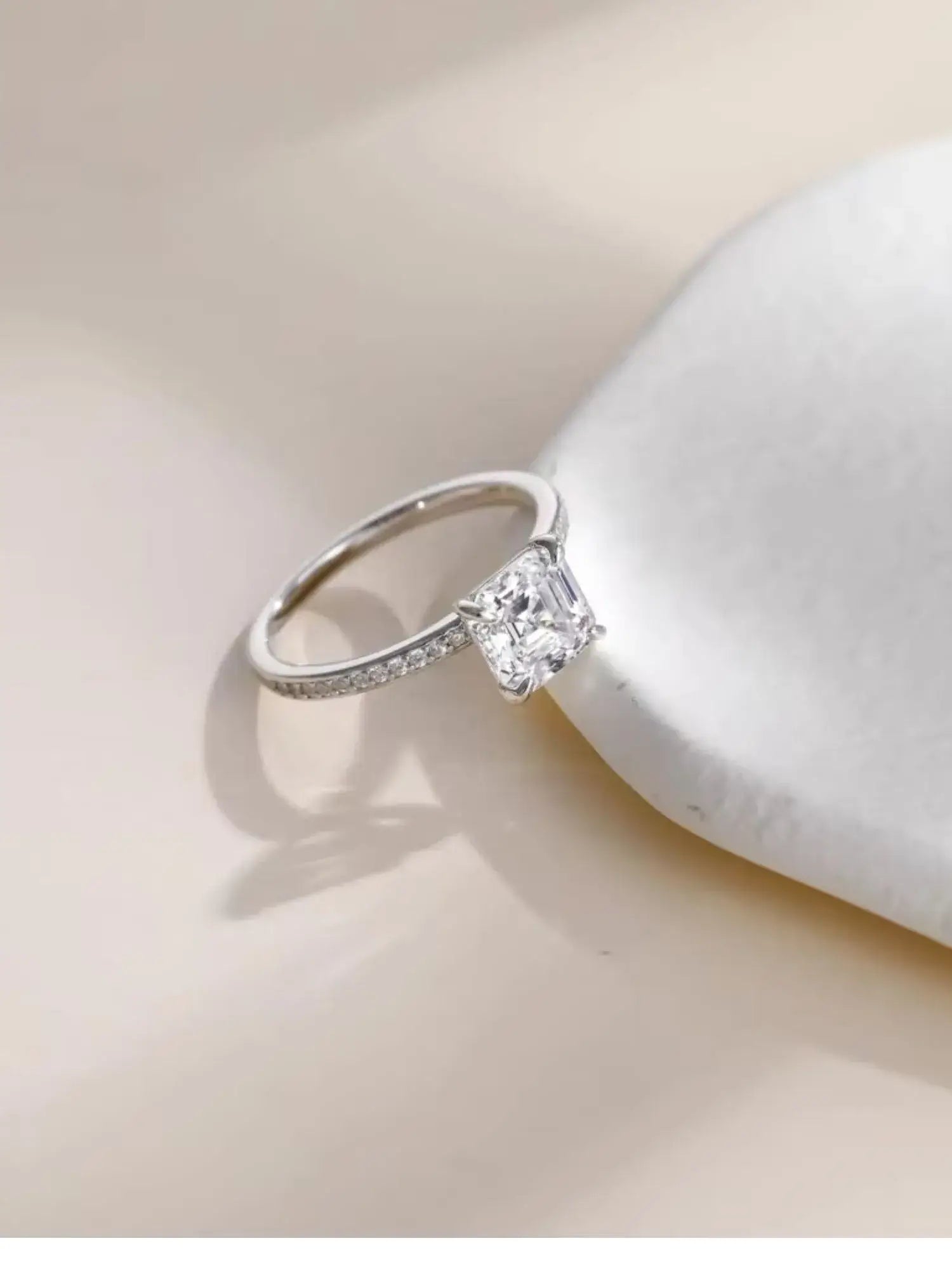 2CT Asscher Cut CZ wedding ring set in 925 sterling silver, showcasing brilliant clarity and vintage-inspired elegance.