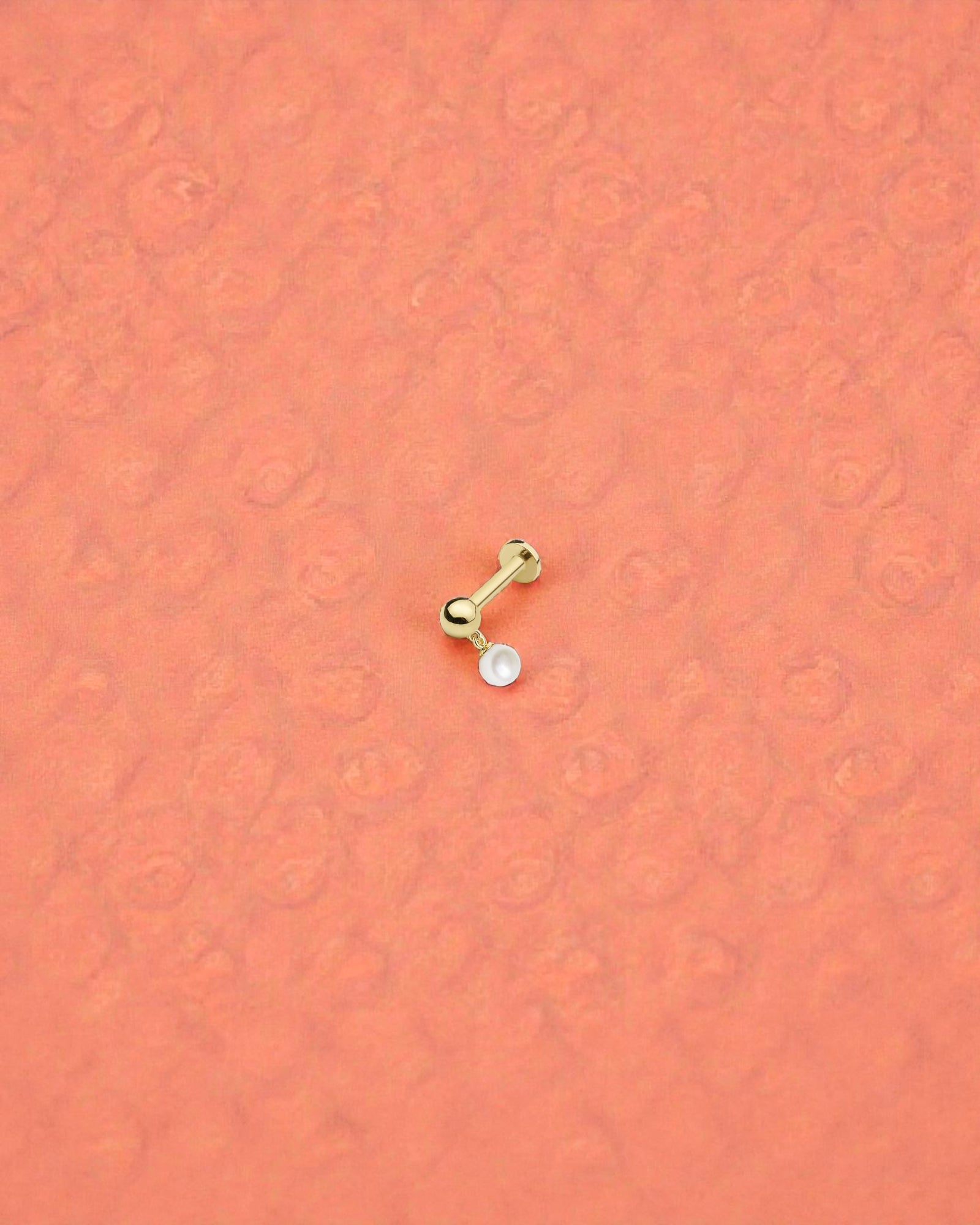 3mm Pearl Flat Back Cartilage Single Piece in Gold on textured background