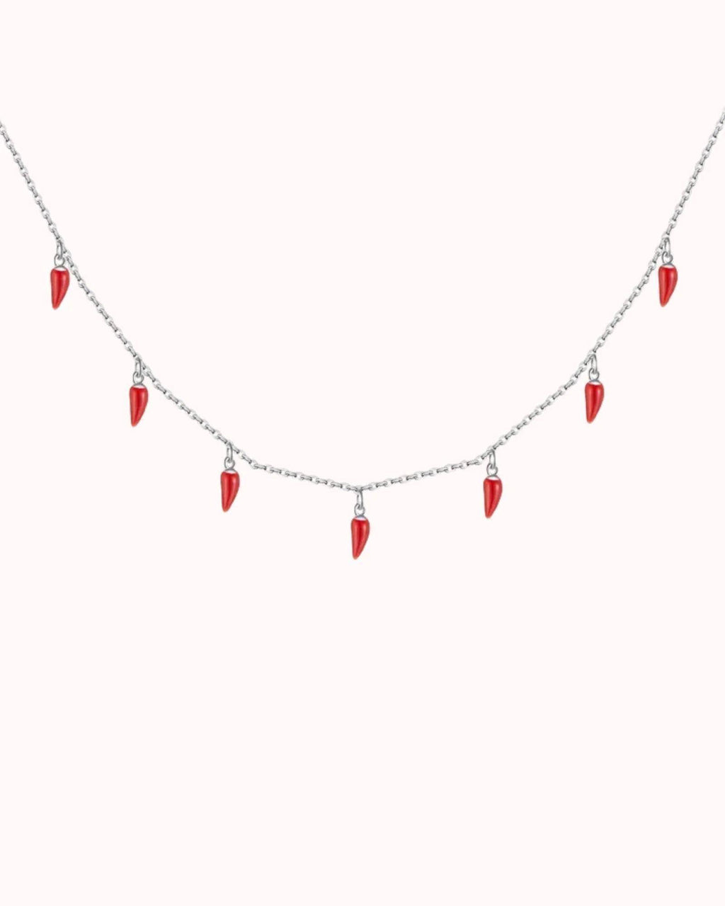 Spicy Bloom Chilli Charm Necklace featuring red chilli charms on a delicate silver chain.