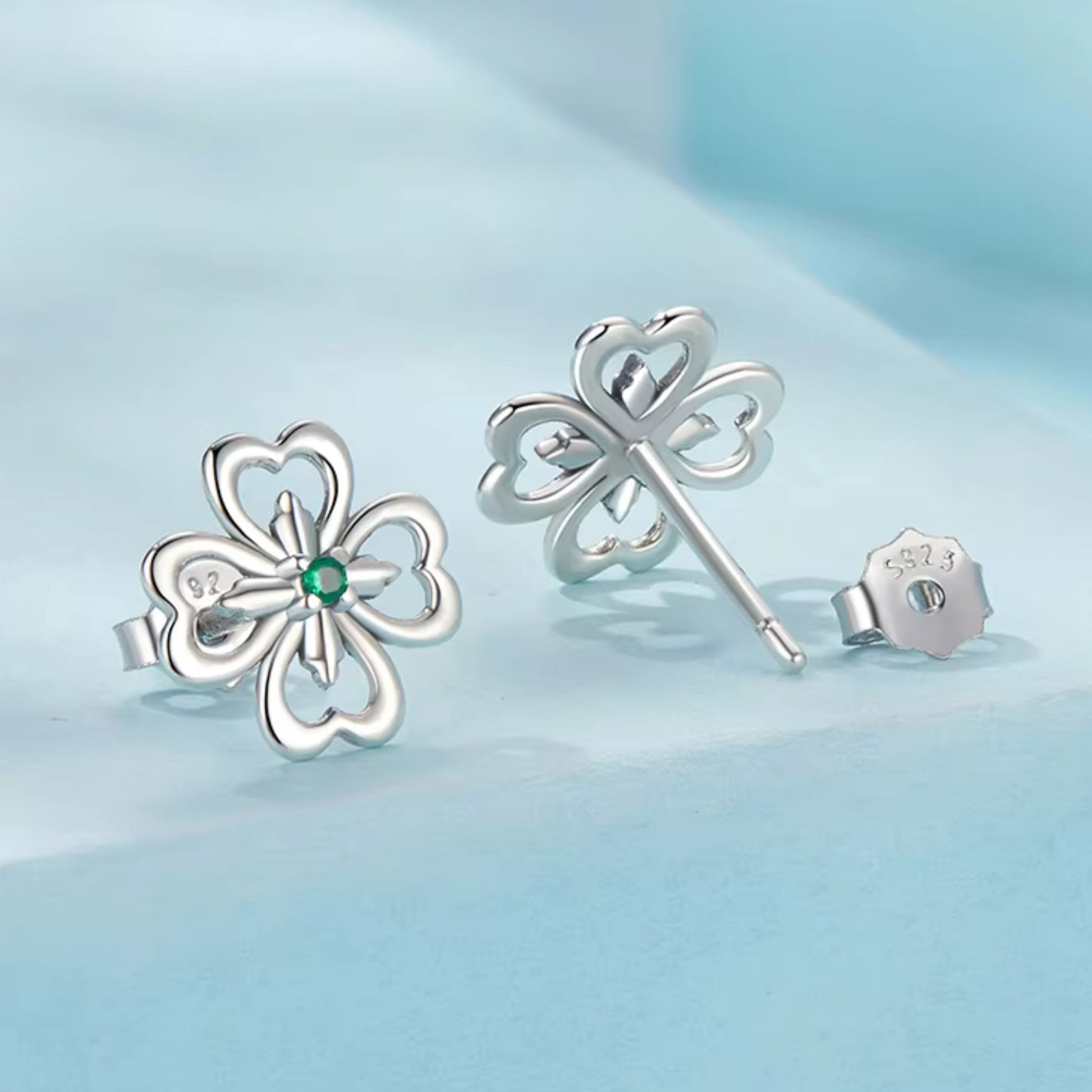 Four Leaf Clover Stud Earrings made of 925 sterling silver with green zircon, showcasing sophistication and luck.