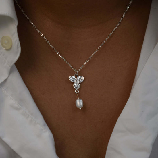  A woman wearing Pearl necklace in sterling silver