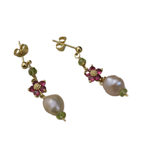 A beautiful dainty pearl and peridot earring