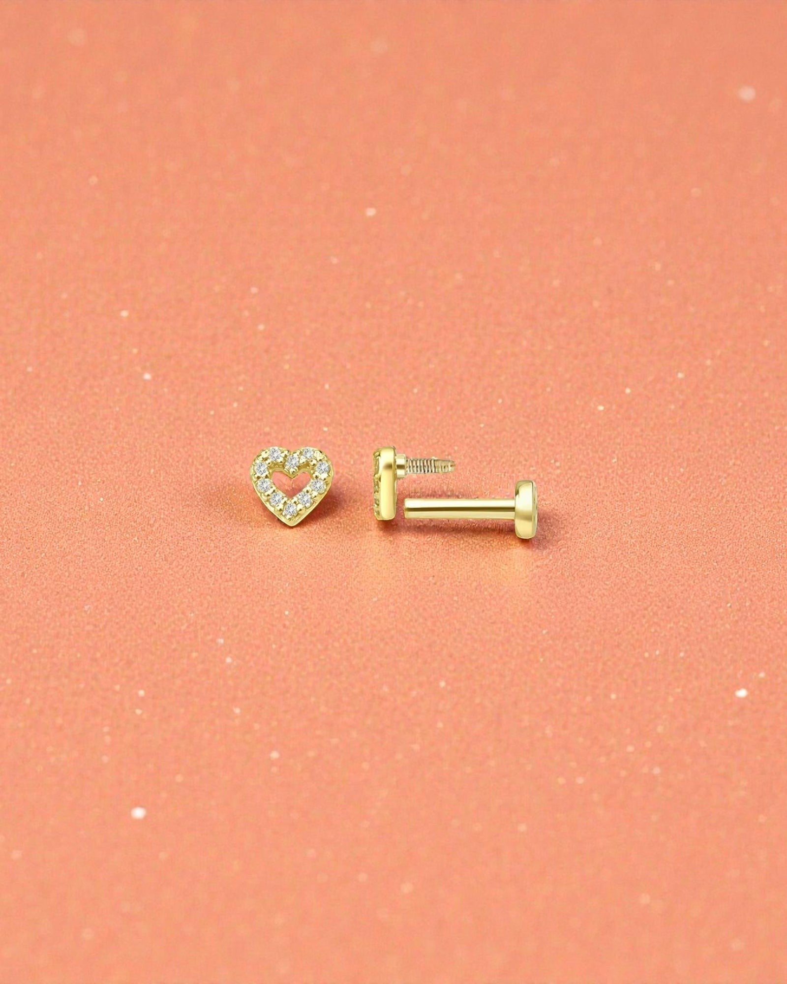 Pearlstones gold plated sterling silver heart cartilage stud with cubic zirconia and flat back.