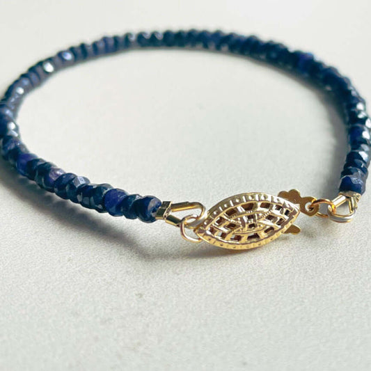 Blue sapphire beaded bracelet in gold filled, featuring a fish hook clasp.