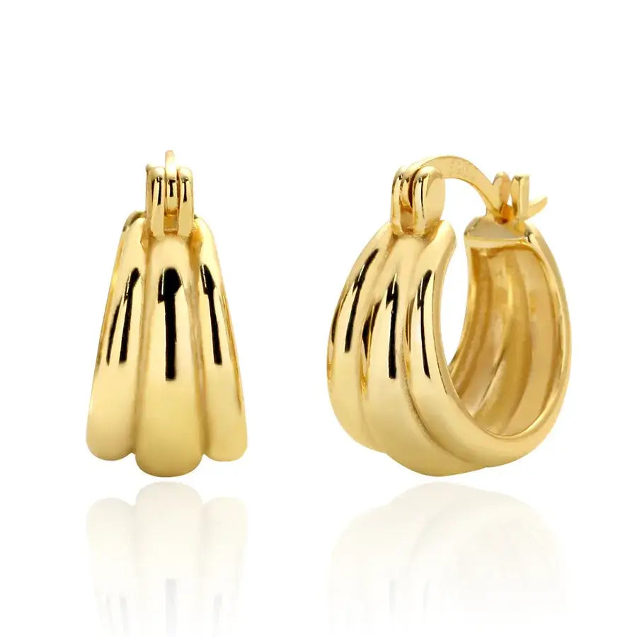 Aura Curve Hoop Earrings in gold, showcasing a sculptural design with soft, wave-like curves and a polished finish.