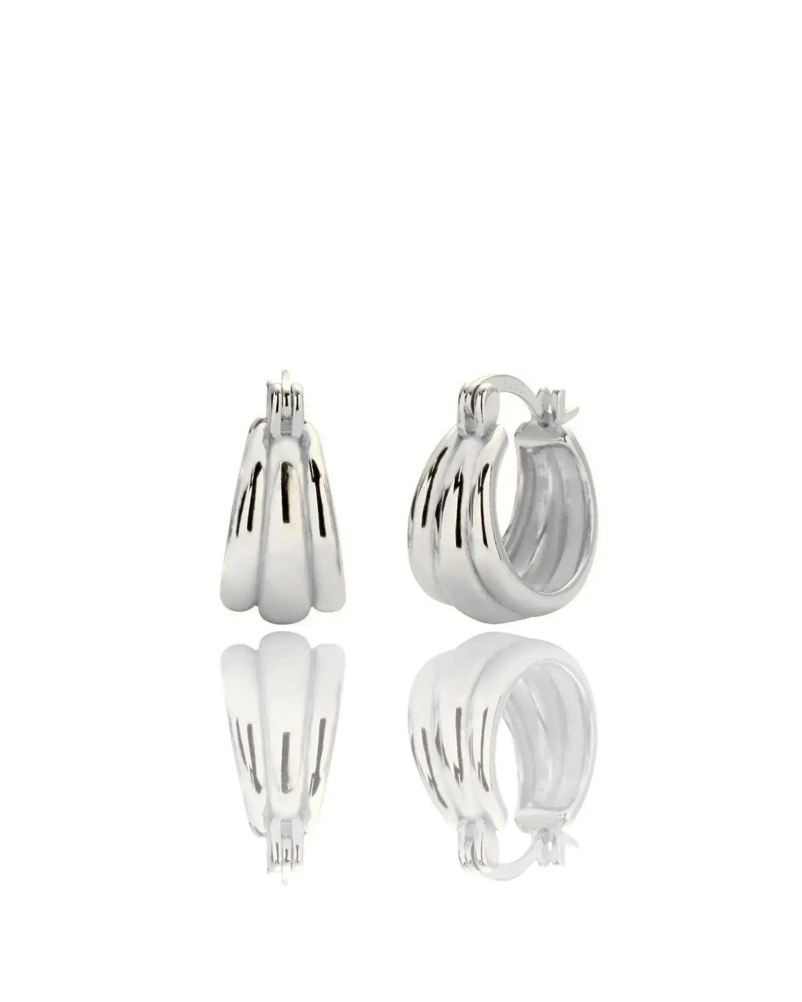 Aura Curve Hoop Earrings in sterling silver with a sculptural, geometric design reflecting light beautifully.