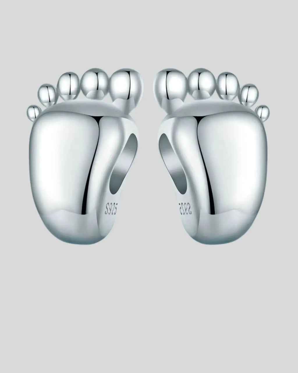Engravable sterling silver baby feet charm, perfect for personalized jewelry to celebrate special moments.