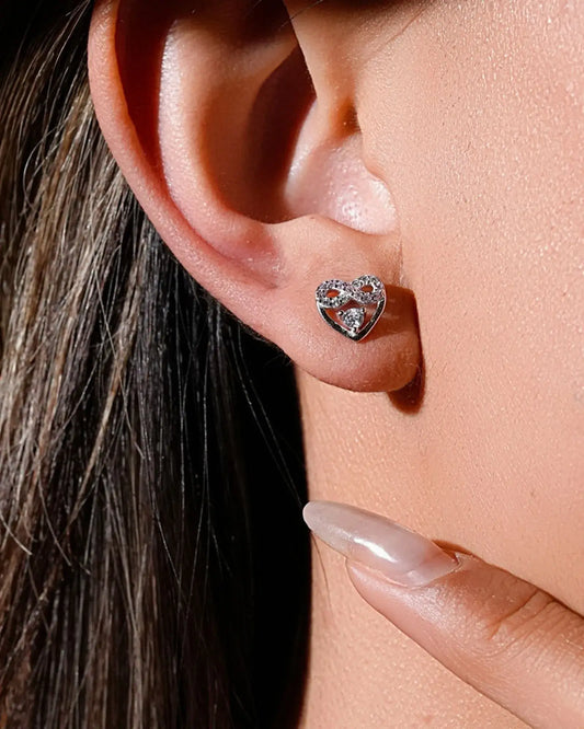 Eternal Blush Heart Ear Studs in sterling silver with pink and white stones, highlighting elegance and timeless love.