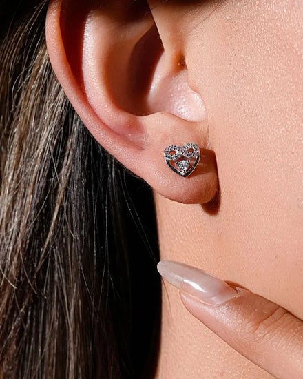Eternal Blush Heart Ear Studs in sterling silver with pink and white stones, highlighting elegance and timeless love.