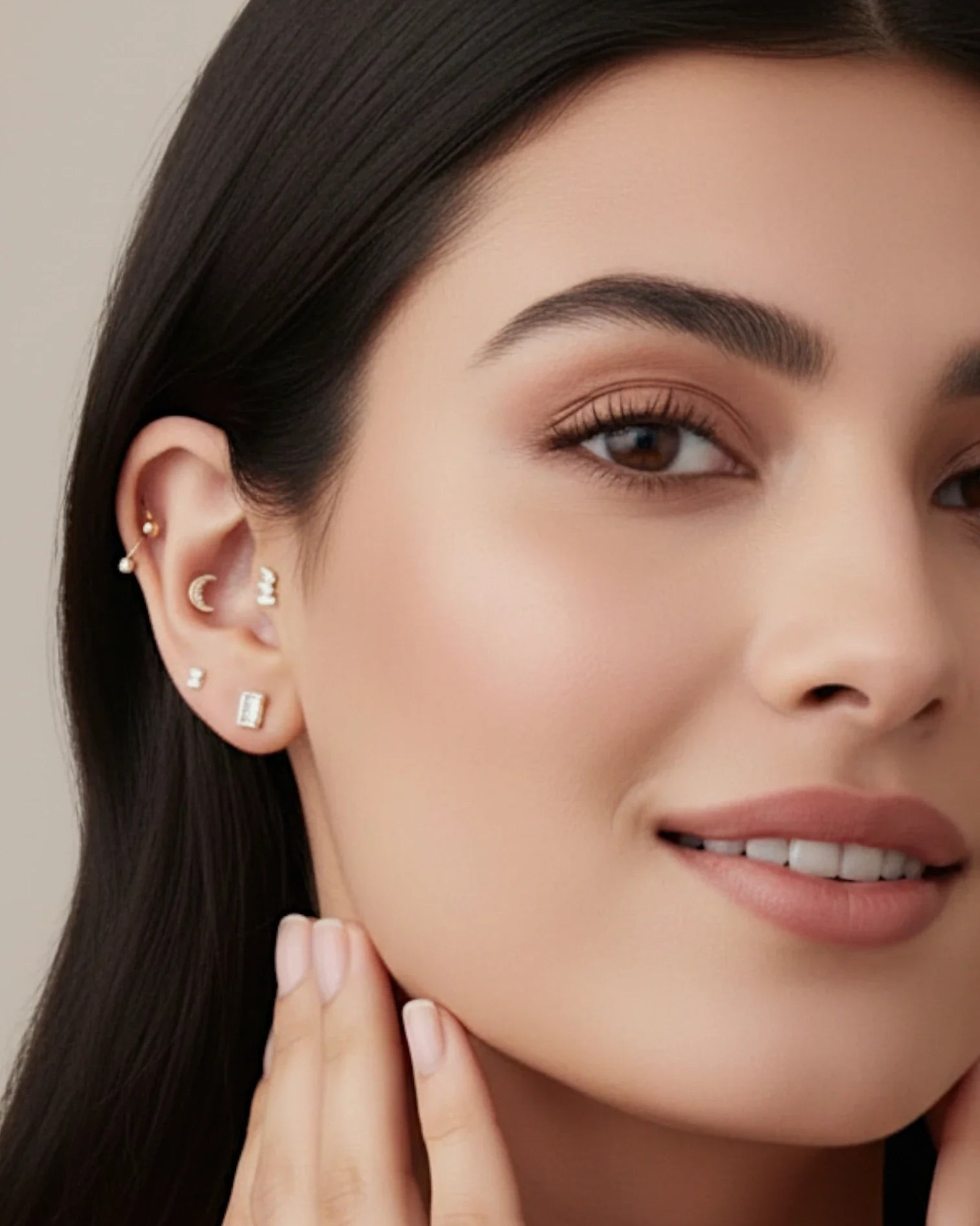 Model showcasing a collection of earrings including a Single piece Crescent Moon Flat Back Stud.