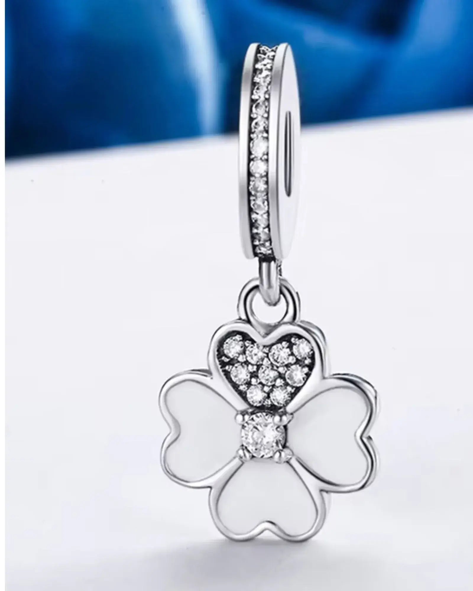 Heart Petals Clover Dangle Charm in 925 Sterling Silver with sparkling accents, perfect for adding love and luck to any accessory.