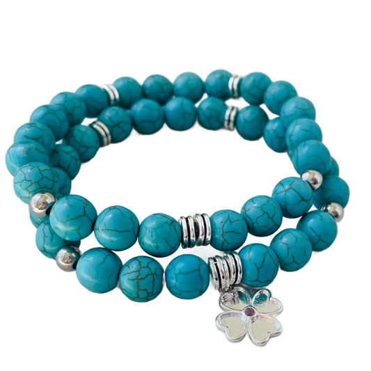 Turquoise bracelet with clover leaf charm  