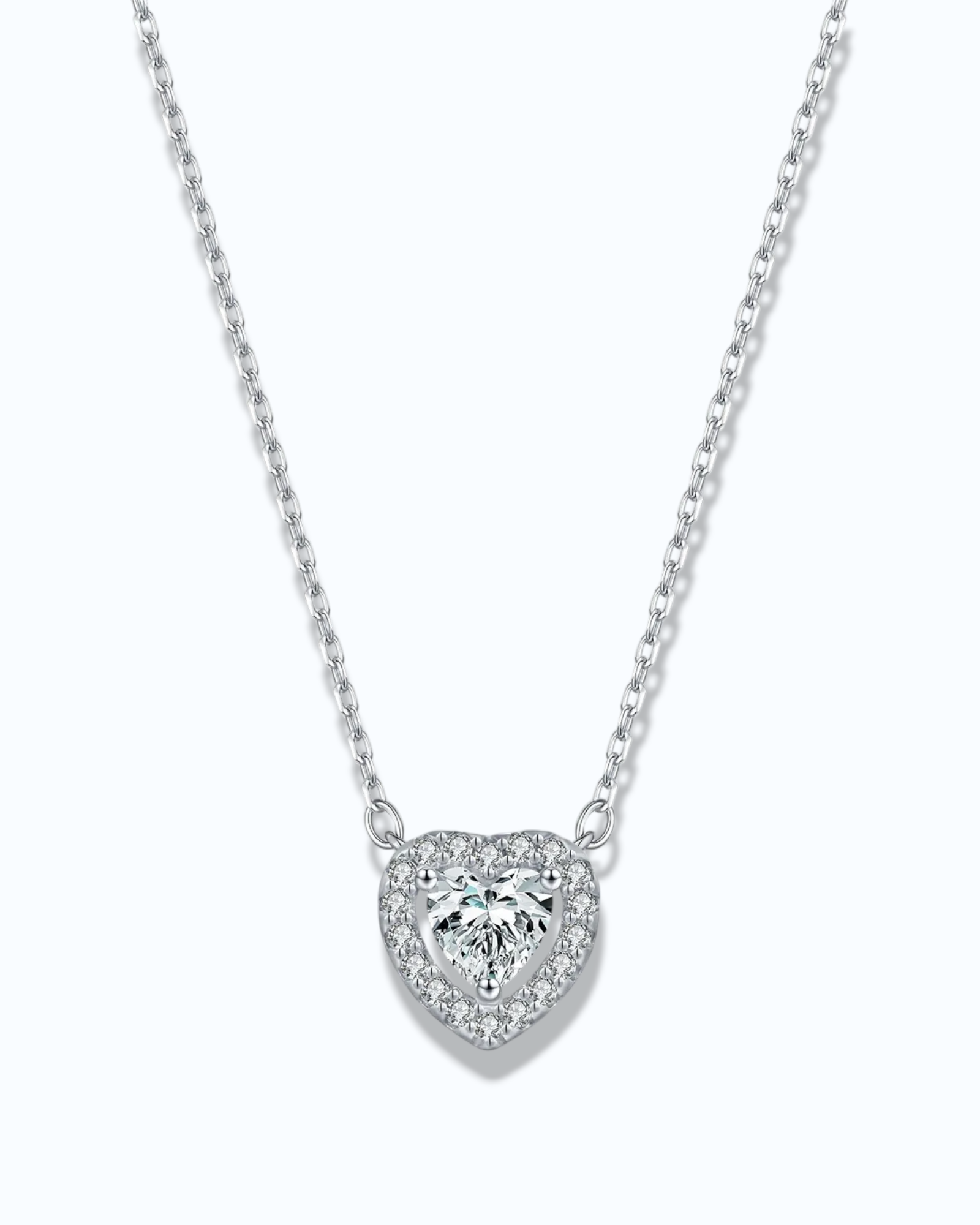 0.5 Ct Hollow heart Moissanite necklace on a delicate chain with sparkling details.