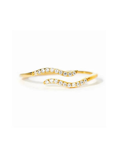 Handcrafted minimalist Single Wave Ring in 18k gold, featuring delicate pavé-set stones for a timeless look.