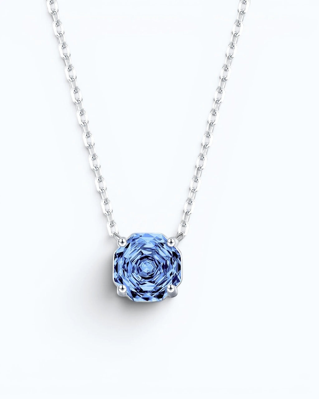 Pearlsstones octagonal rose cut tanzanite blue zircon pendant necklace in rhodium-plated sterling silver.