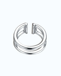 double ear cuff jewellery in silver featuring two linked half circles for a stylish look.