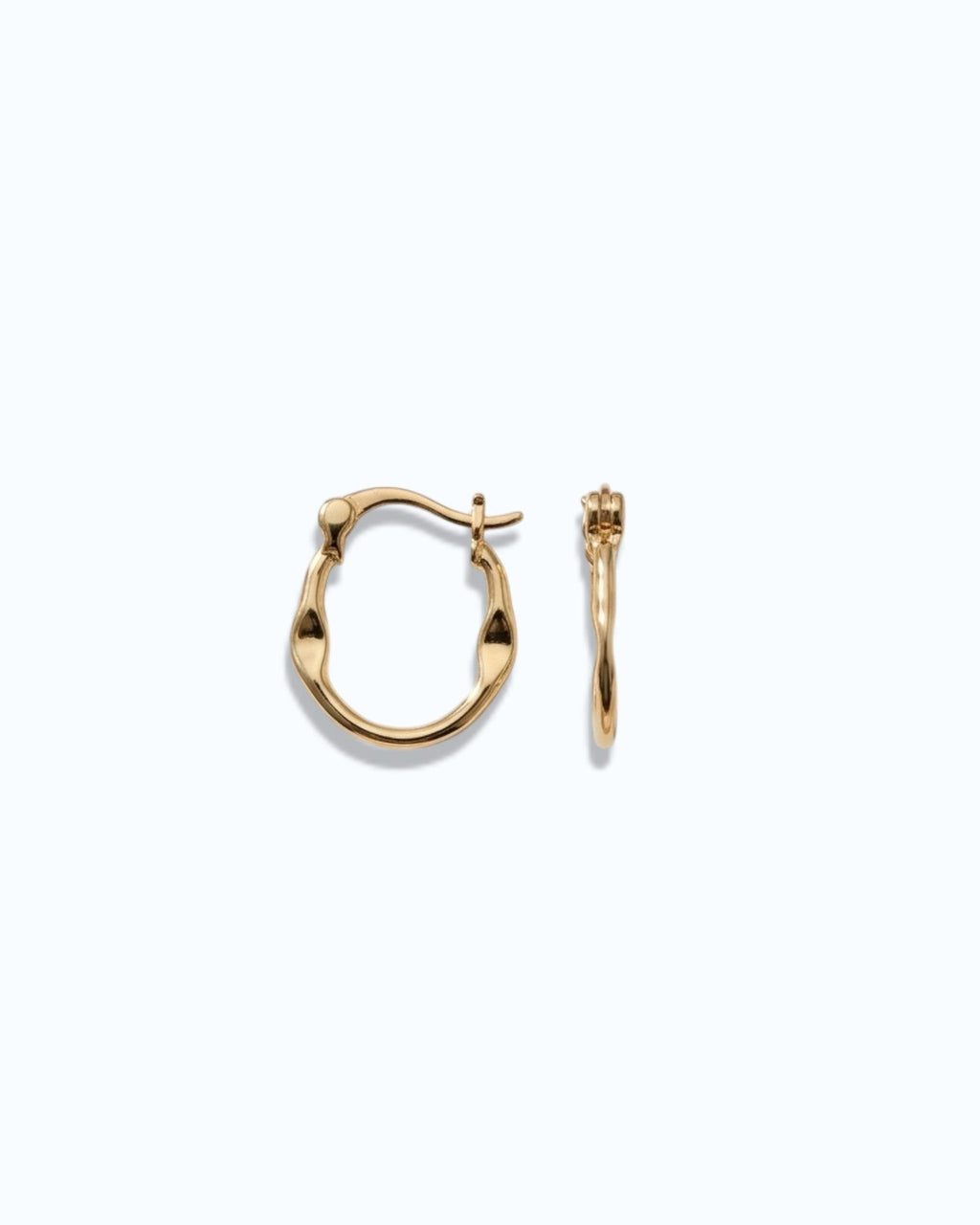 Pearlstones gold molten texture medium hoop earrings with hinged creole closure.