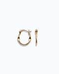 Pearlstones gold molten texture medium hoop earrings with hinged creole closure.