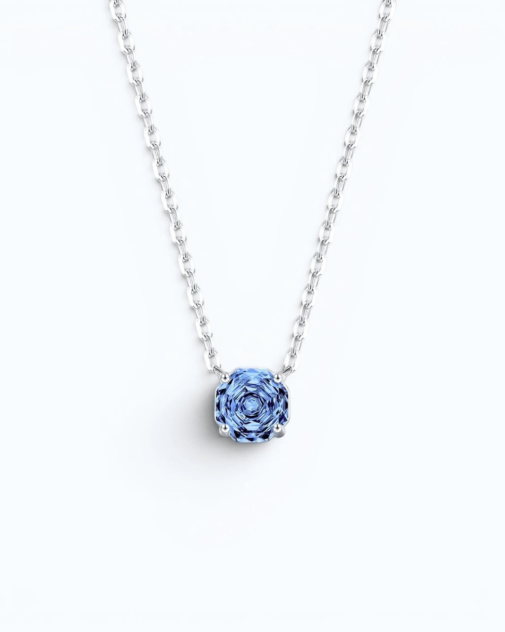 Pearlsstones octagonal rose cut tanzanite blue zircon pendant necklace in rhodium-plated sterling silver.